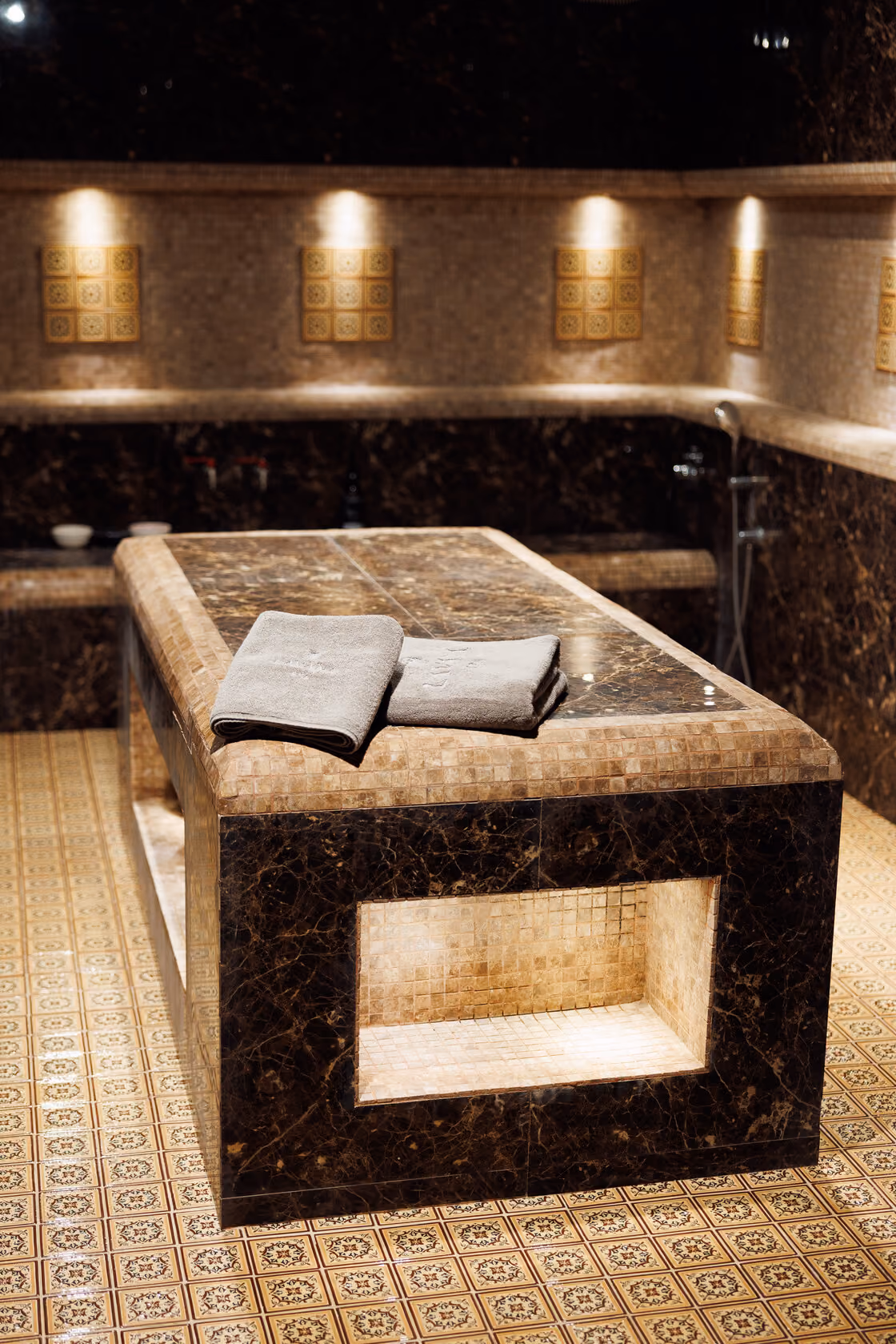 The hammam room at our Bur Dubai branch, with the marble slab the Moroccan Bath is run on