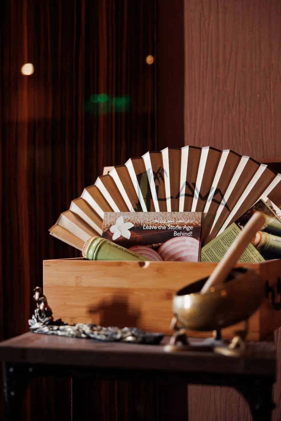 Wooden kessa gloves, black soap and a bowl laid out for the Moroccan Bath at Bur Dubai